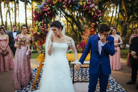 Bride and groom crying in the altar