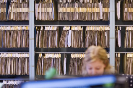 An official of the canton of St. Gallen's tax administration works in her office in front of a wall of files, pictured on January 18, 2010 in St. Gallen, Switzerland. (KEYSTONE/Gaetan Bally)

Eine Beamtin des Kantonalen Steueramts St. Gallen arbeitet in ihrem Buero vor einer Wand aus Akten, aufgenommen am 18. Januar 2010 in St. Gallen. (KEYSTONE/Gaetan Bally)