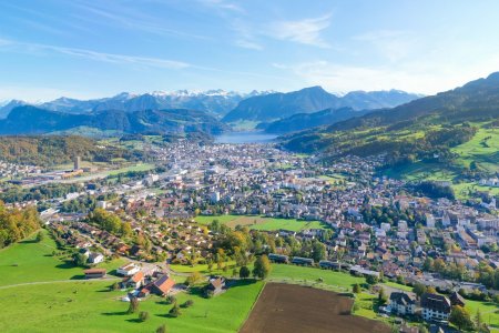 Kriens village, canton of Lucerne. Switzerland. Pilatus peak. Aerial view. City skyline and village landscape