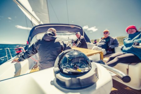Adventure friends on the sailing boat
