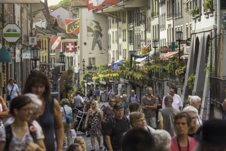 A crowded street on a summer's day in the old town of Thun, a popular tourist destination in the canton of Bern.