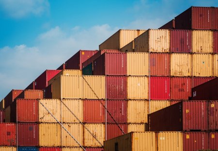 stack of cargo containers ready for shipping