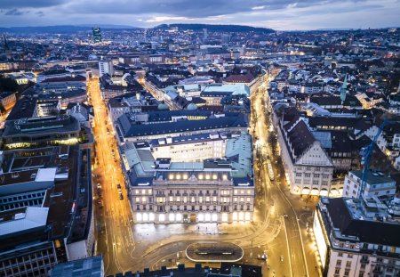 An aerial view shows the headquarters of the Swiss banks Credit Suisse, center, and UBS, left, at Paradeplatz in Zurich, Switzerland on Sunday March 19, 2023. (KEYSTONE/Michael Buholzer).
