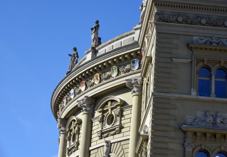 The Federal Palace of Switzerland in Bern during winter season at a sunny day. The Federal Palace was finished in 1902 and houses the Swiss Parliament.