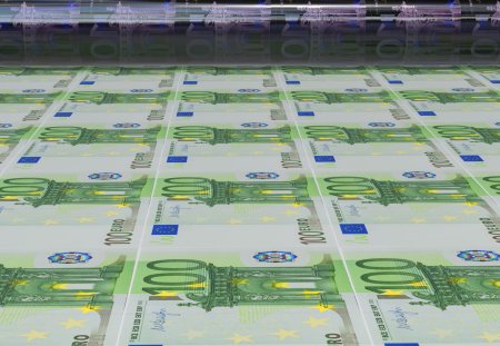 Business success, finance, banking, accounting and making money concept: printing 100 Euro money paper cash banknotes on print machine in typography