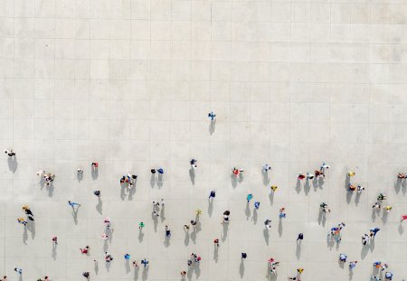 Man standing out of a Crowd