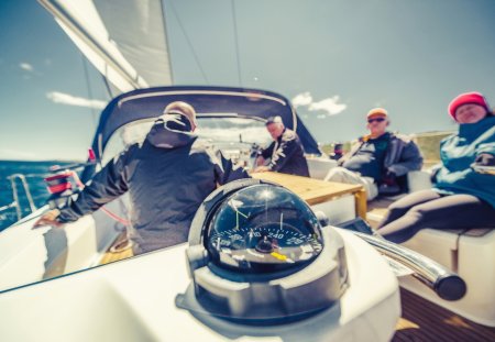 Adventure friends on the sailing boat
