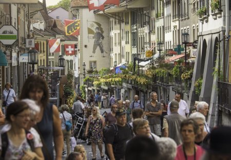 A crowded street on a summer's day in the old town of Thun, a popular tourist destination in the canton of Bern.